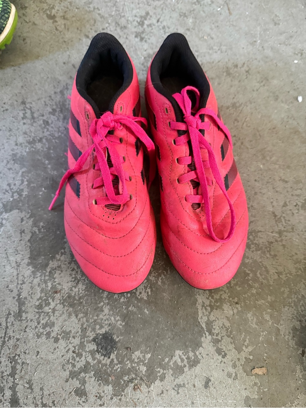 Bright Pink soccer cleats Athletic Sneakers with Black Accents